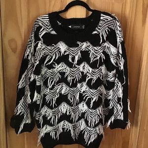MinkPink black & white knit fringed tunic top.  Marked x-s but oversized style.